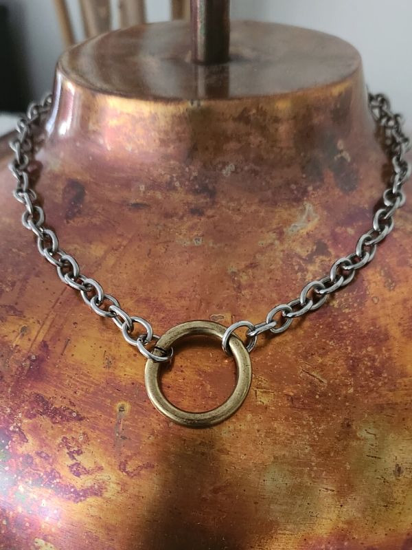 silver brass chunky chain necklace on copper vase